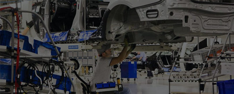 Manufacturing team discussing a Mexico production program